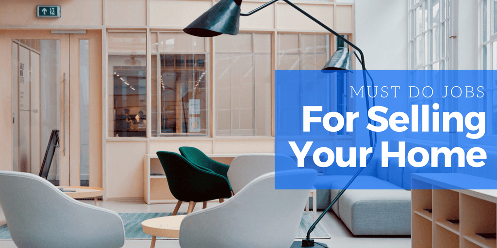 Several modern chairs and lamps in a living room